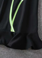 Ivanka Sleeveless Shift Dress with Ruffle Hem in Black